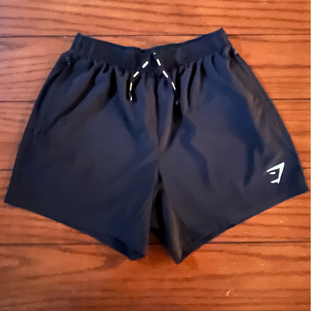 Gymshark 5” athlectic shorts, small. Liteweight material, w/zipper pockets.